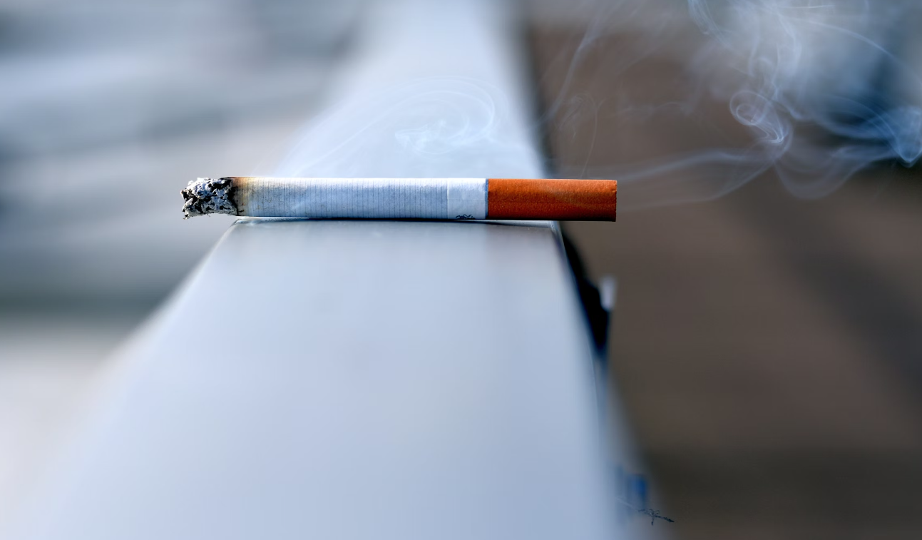 cigarette places on rail.
