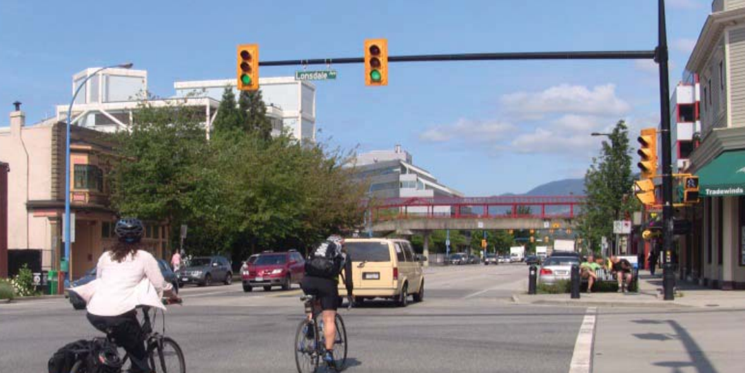 Bikes and cars on road in North Vancouver.