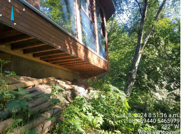 View of north side of the unpermitted building overhanging ToB